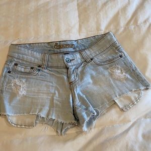 Carmar from shorts, distressed with long pockets.